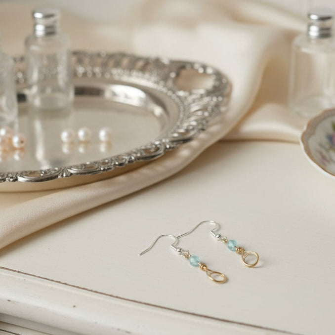 copper earrings with small aqua bead