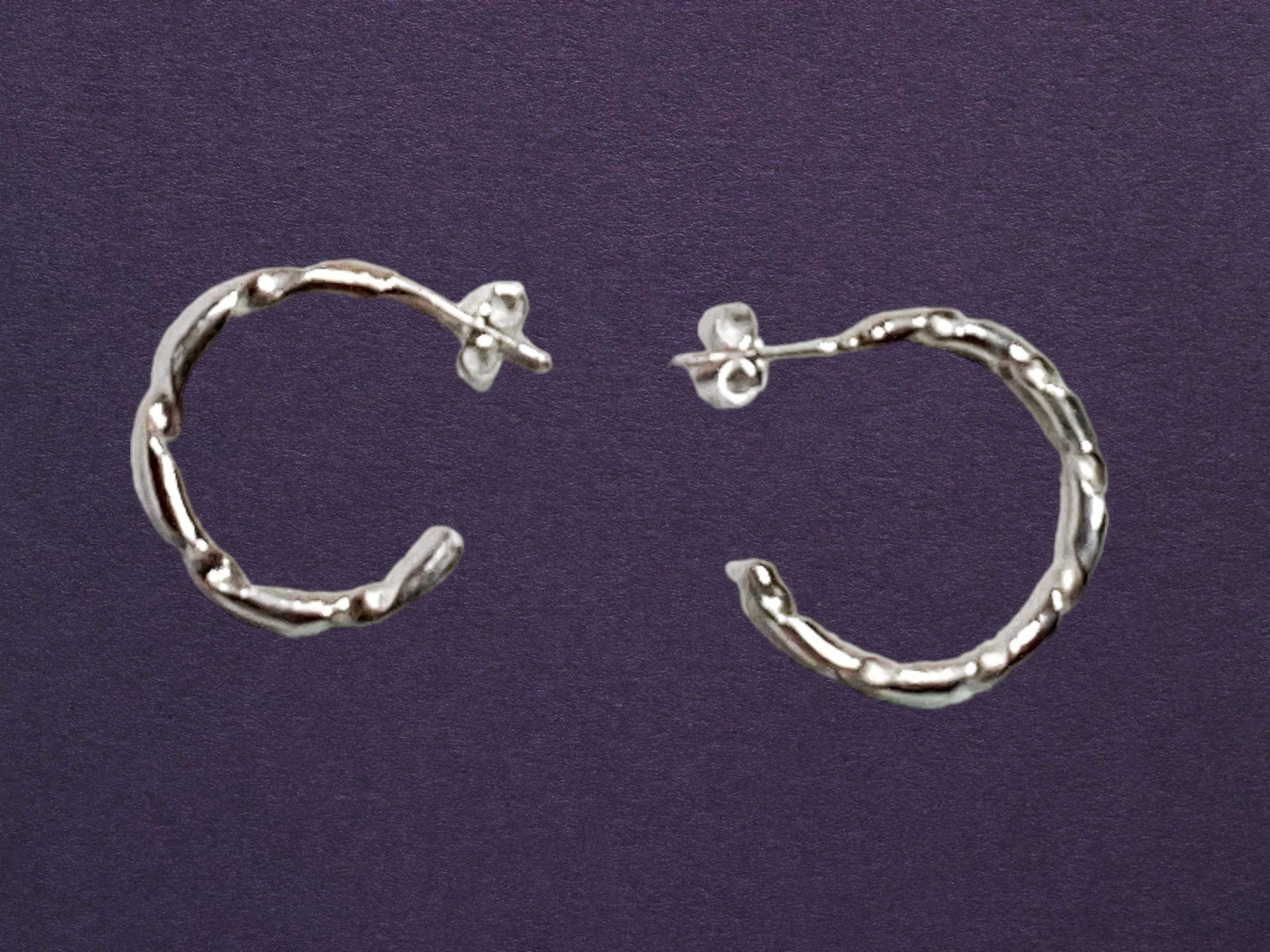 Twisted hoop sterling silver earrings
